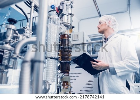 Science lab medical factory staff working for Cannabis CBD oil extraction. Hemp oil extraction Thin Film Distillation Laboratory Plants Process.