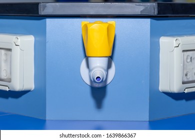 Science Laboratory Gas Nozzle On A Blue Empty School Lab Table In An Educational Setting For Experiements, Analysis And Research - Straight On POV