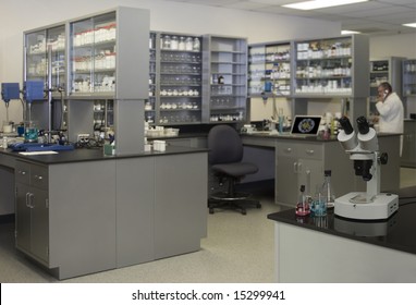 Science laboratory with a microscope in the foreground