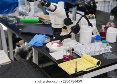Science laboratory setup with equipment and notes for research and experiment