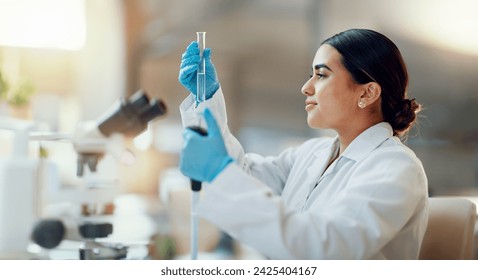 Science, laboratory and woman with pipette, test tube and biotech solution in research. Medical innovation, scientist or lab technician in study for healthcare, medicine and vaccine results feedback. - Powered by Shutterstock