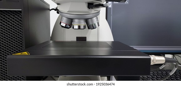 Science Microscope On Lab Bench,Microscope In Modern Lab For Scientist Research Or Medical.