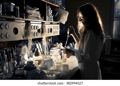 Science Professional Is Working In Old Laboratory