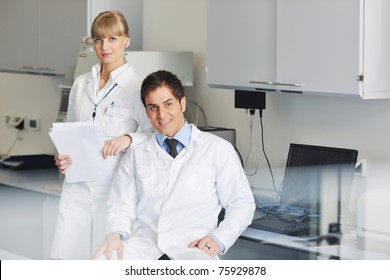 science and research biology chemistry and medicine  young people couple in bright modern  lab - Shutterstock ID 75929878