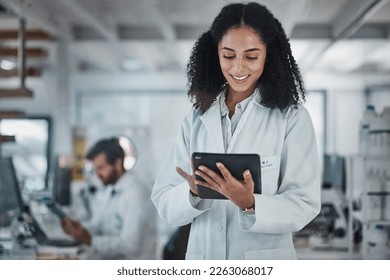 Science, research and black woman with tablet, smile and internet in laboratory with medical data. Healthcare, pharmaceutical innovation and scientist, technology and reading email, website or result - Powered by Shutterstock