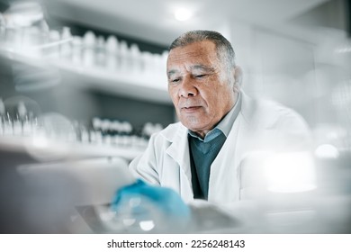 Science, research and senior man scientist working on experiment, tests or study in the lab. Medical, healthcare and elderly male biologist with data analysis for scientific innovation in laboratory. - Powered by Shutterstock