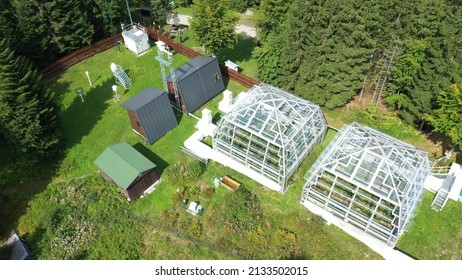 Science station greenhouse drone aerial open top chambers climate change research Bily Kriz, plant spruce Picea abies Norway European and mountain beech Fagus sylvatica common for scientific