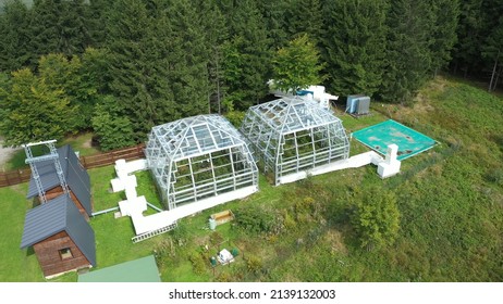 Science station greenhouse drone aerial open top chambers climate change research Bily Kriz, plant spruce Picea abies Norway European and mountain beech Fagus sylvatica common for scientific