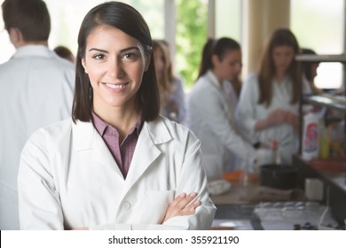 Science Students Working With Chemicals In The Lab At The University.Happy Student, Content For Experimental Results.Pharmacy.Young Medicine Developer Pharmaceutical Researcher