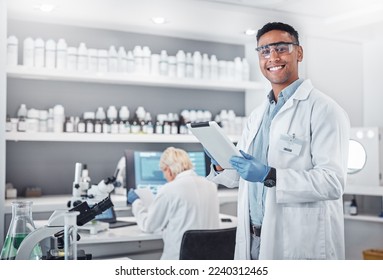 Science, tablet and portrait of a male scientist doing research with technology in a medical laboratory. Happy, smile and man chemist or biologist working on a mobile device in a pharmaceutical lab. - Shutterstock ID 2240312465