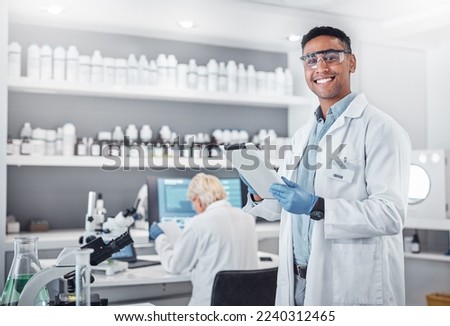 Science, tablet and portrait of a male scientist doing research with technology in a medical laboratory. Happy, smile and man chemist or biologist working on a mobile device in a pharmaceutical lab.