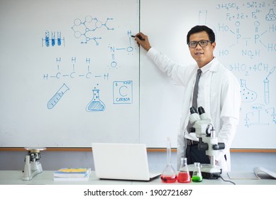 Science Teacher In Front Of The Class.