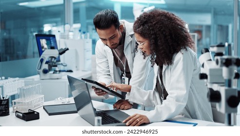 Science, teamwork and scientist with tablet in laboratory for communication, pharmaceutical review or planning. Employees, collaboration and technology for research, discussion and digital analysis - Powered by Shutterstock