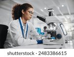 Science, woman and research with microscope in lab for investigation, development and bacteria test. Scientist, innovation and biotech with planning for stem cell study, exam or growth in vaccinology