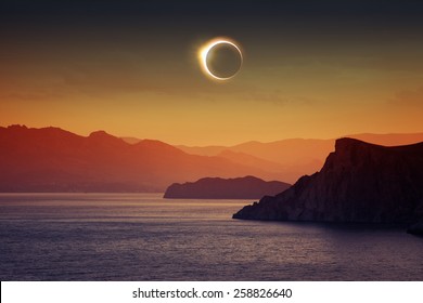 Scientific background, astronomical phenomenon - full total solar eclipse, mountains and sea