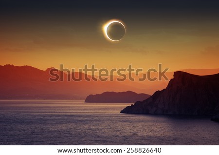 Scientific background, astronomical phenomenon - full total solar eclipse, mountains and sea