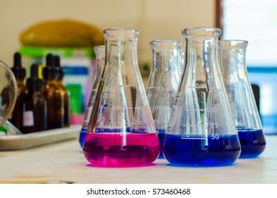 Scientific Experiments With Chemicals In Blue And Pink. Ammonia,nitrite