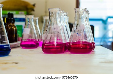 Scientific Experiments With Chemicals In Blue And Pink. Ammonia,nitrite