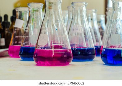 Scientific Experiments With Chemicals In Blue And Pink. Ammonia,nitrite