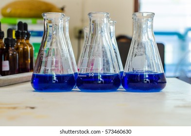 Scientific Experiments With Chemicals In Blue And Pink. Ammonia,nitrite