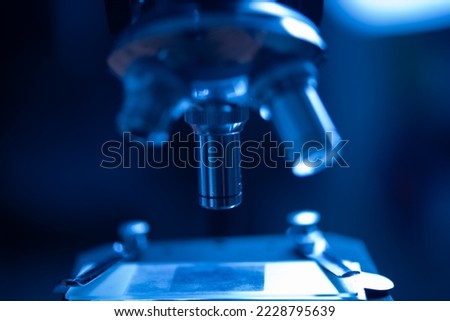 Scientific microscope data analysis in the metal lens at laboratory. research medicine concept.