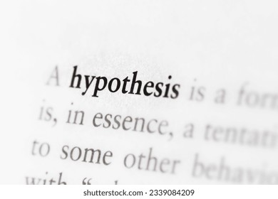 Scientific term hypothesis printed in textbook focused in closeup of explanation Stock Photo