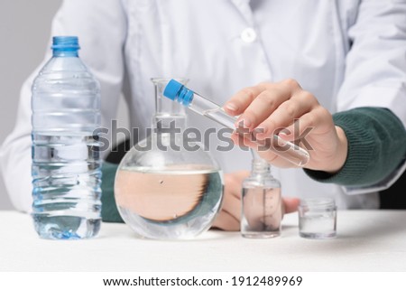 Scientist is analysing and testing a water concept.