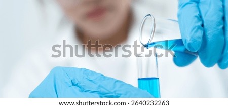 Scientist analyze biochemical samples in advanced scientific laboratory. Medical professional use dropper mix microbiological developmental of viral. Biotechnology research in  science lab. cosmetic