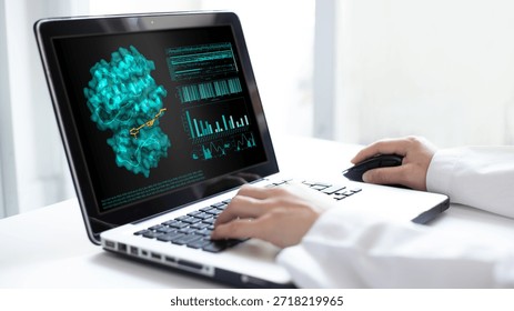 Scientist analyzing 3D molecular docking and protein ligand interaction on laptop. The screen displays 3D structural model with bioinformatics data, graphs, and text data of amino acid sequences.