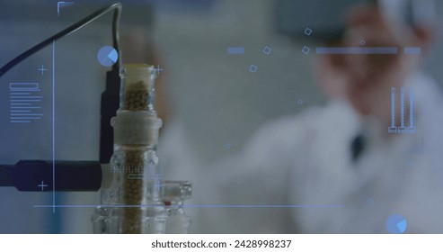 Scientist analyzing data in a laboratory setting. The focus on advanced equipment suggests cutting-edge research work. - Powered by Shutterstock