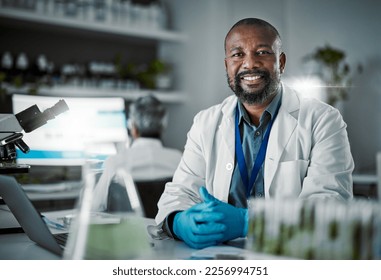 Scientist black man, portrait and lab with smile for research, plants and vision with innovation with senior woman. African science expert, happy and motivation at desk with pride, goals and mission