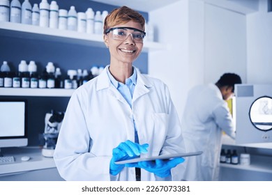 Scientist, black woman and working on tablet in laboratory for planning, innovation and research. Portrait, happy science worker and digital medicine for development, data analysis and biotechnology