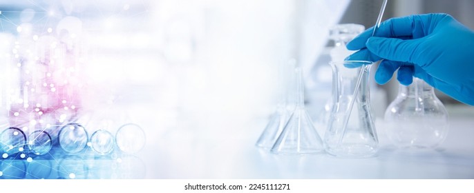 scientist in blur gloves with glass flask and test tube in research science lab banner background