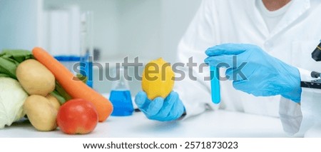 Scientist check chemical food residues in laboratory. Control experts inspect quality of fruits, vegetables. lab, hazards, ROHs, find prohibited substances, contaminate, Microscope, Microbiologist