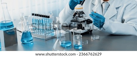 Scientist conduct chemical experiments and research in medical lab as groundbreaking developing for vaccine drug or antibiotic. Pharmaceutical and biochemistry laboratory. Neoteric