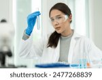 Scientist doing chemical test in research lab to study vaccine