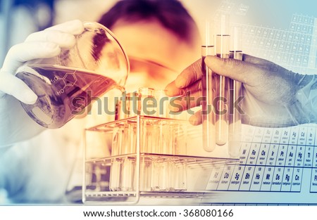 scientist with equipment and science experiments ,Laboratory glassware containing chemical liquid, science research background.