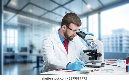 Scientist examining a sample with microscope, research concept - Powered by Shutterstock - Get 15% off with code: PIKWIZARD15