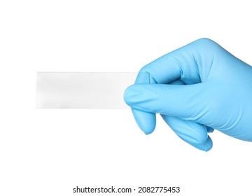 Scientist holding clean microscope slide on white background, closeup