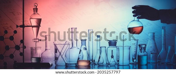 Scientist holding flask lab\
glassware in laboratory, science laboratory research and\
development