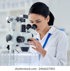Scientist, innovation and microscope for medical or research, experiment and data analysis in laboratory for development. Woman, DNA and investigation for bacteria test with biotechnology equipment