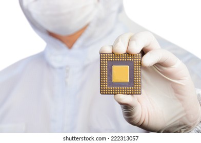 Scientist In Jumpsuit Holding A Microchip 