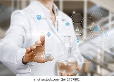 A scientist in a lab coat stands in a laboratory, holding a flask while interacting with a digital interface displaying various scientific icons and data. The setting is modern and well-equipped.