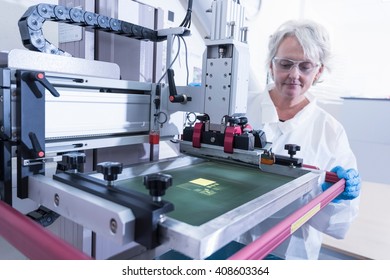 Scientist printing graphene ink test in graphene processing factory - Powered by Shutterstock