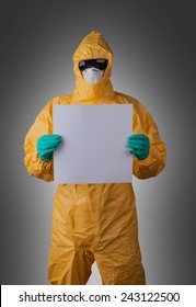 Scientist With Protective Yellow Hazmat Suit, Ebola Concept.