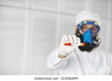 A Scientist Researcher In The Laboratory Is Testing Drugs For Treatment Of Viral Pneumonia. Coronovirus Blood Test Of Infected Patients. World Pandemic.