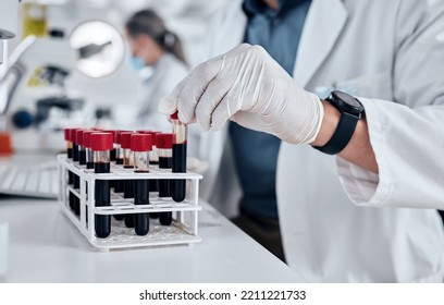 Scientist, Science And Dna Blood Sample Test Tube In Pathology Lab With Gloves Doing Research And Working On Vaccine Or Medical Investigation. Innovation, Breakthrough And Medicine With Hands Of Man