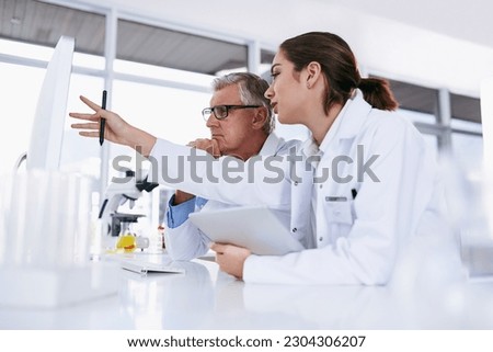 Scientist, tablet and teamwork in science experiment, results or collaboration on computer at the laboratory. Woman and man mentor in medical research working together on pc with scientific student