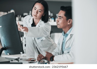 Scientist, teamwork and computer for medical analysis or laboratory report, research and training support. Science doctors or people talking of vaccine solution, advice and desktop for online results - Powered by Shutterstock