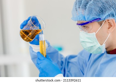 Scientist Testing Petrochemical Fuel Formula In Science Lab. Synthetic Oil Lube Test And Analysis In Laboratory.